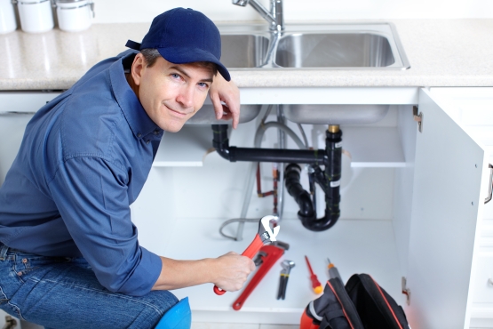 Fast Fix Plumbers team member at work